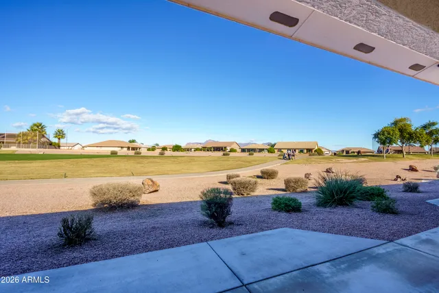 a view of a lake with beach and ocean view