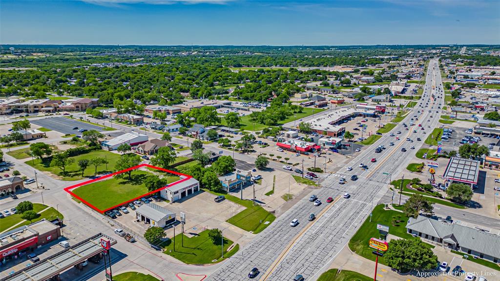 124 Southwest Anderson Street Burleson, TX 76028 - Photo 2 of 36 an aerial view of residential houses with outdoor space