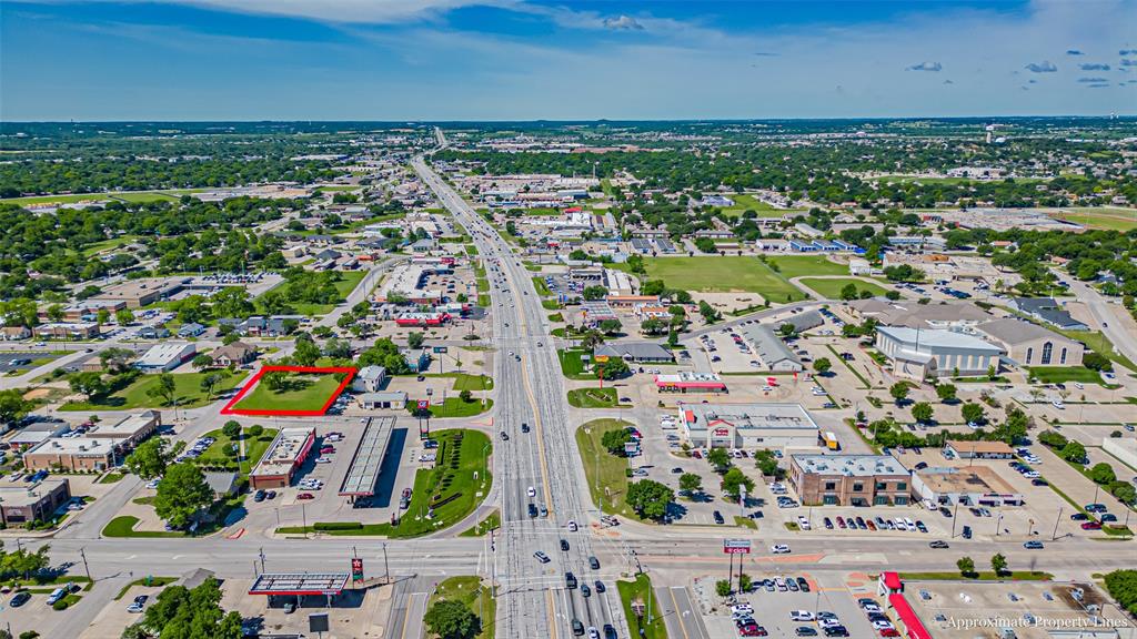 124 Southwest Anderson Street Burleson, TX 76028 - Photo 33 of 36 an aerial view of residential building and car parked