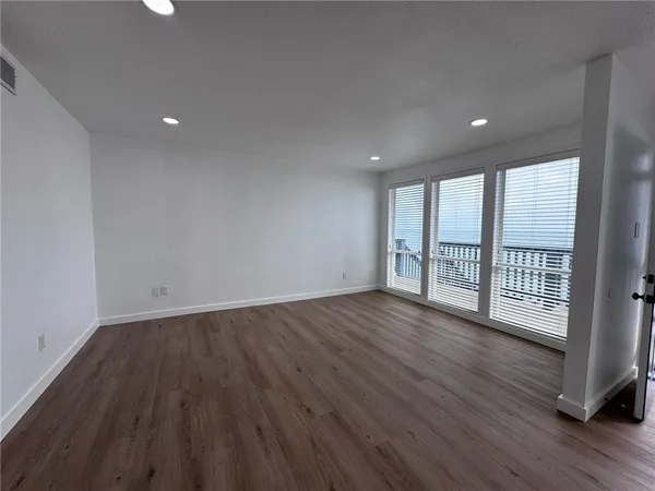 a kitchen with a sink and a window