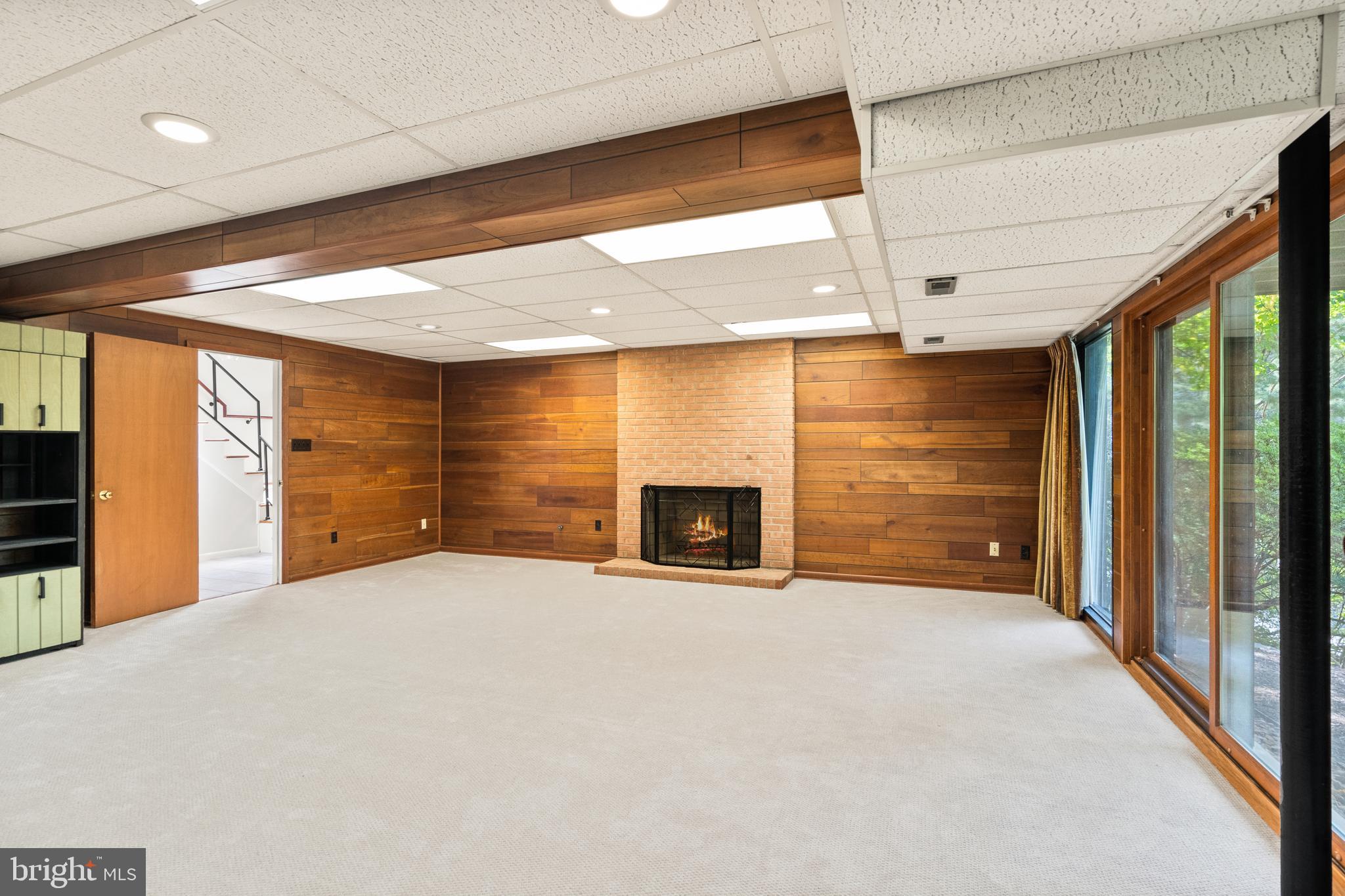 11233 South Shore Road Reston, VA 20190 - Photo 6 of 44 Rec room with wood burning fireplace