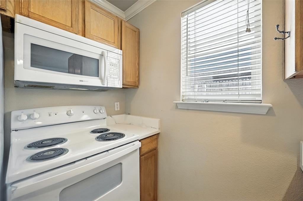 1321 Village Garden Azle, TX 76020 - Photo 9 of 20 a utility room with dryer and washer
