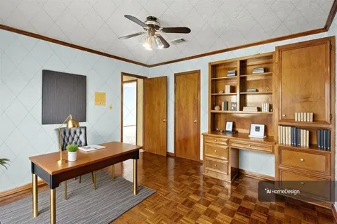 a workspace with furniture window and wooden floor