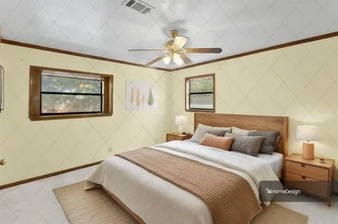 a bedroom with a bed and a painting on the wall