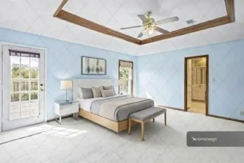 a spacious bedroom with a bed and a chandelier