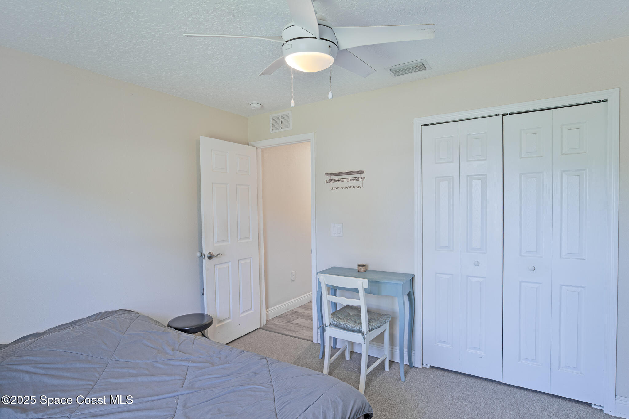 7350 Barbara Road Cocoa, FL 32927 - Photo 9 of 26 a view of a room with chairs and table