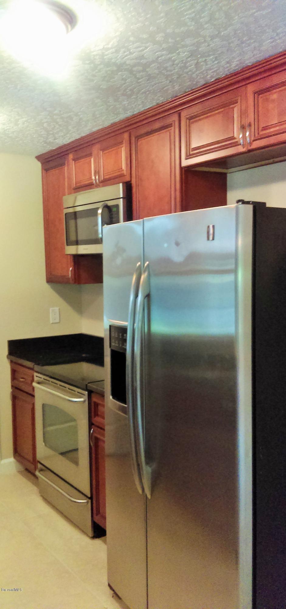 1013 Hayden Road Rockledge, FL 32955 - Photo 4 of 23 IMAG0188