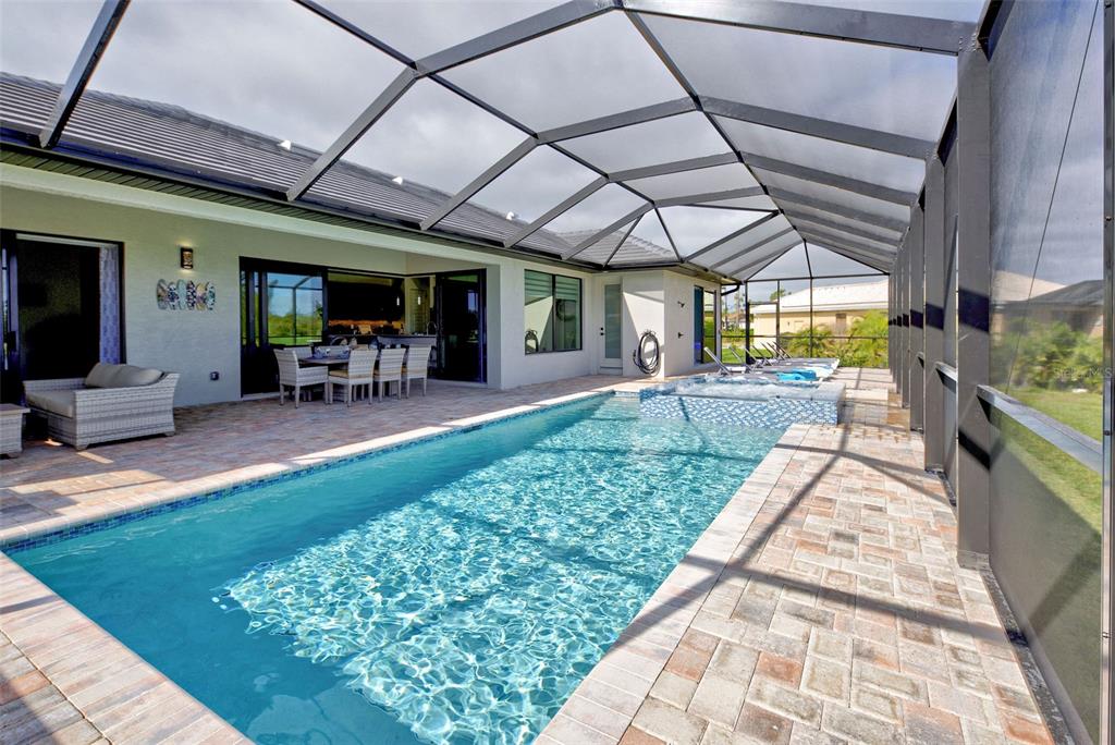 19 Windward Road Placida, FL 33946 - Photo 12 of 56 a view of a backyard with patio