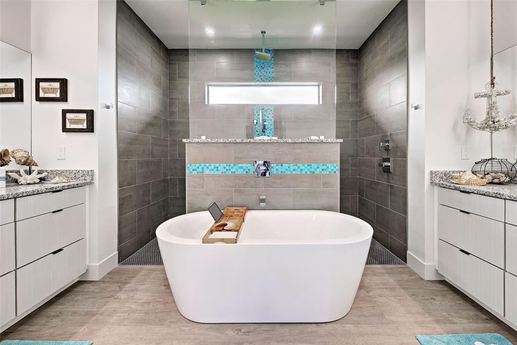19 Windward Road Placida, FL 33946 - Photo 15 of 55 a white bath tub sitting in a bathroom with shower