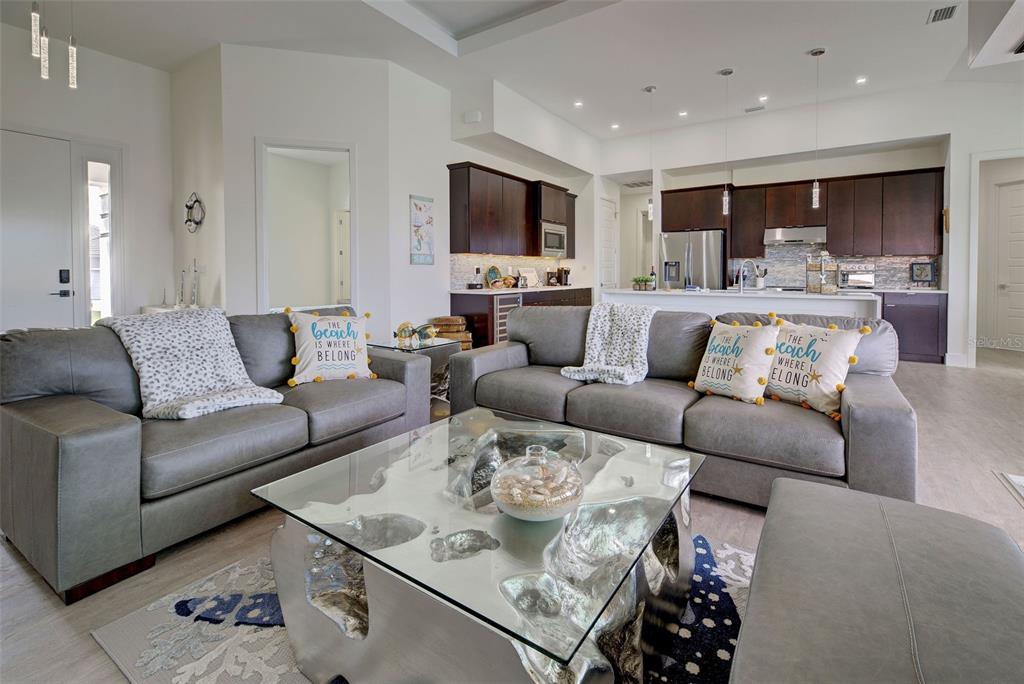 19 Windward Road Placida, FL 33946 - Photo 21 of 56 a living room with furniture and a flat screen tv