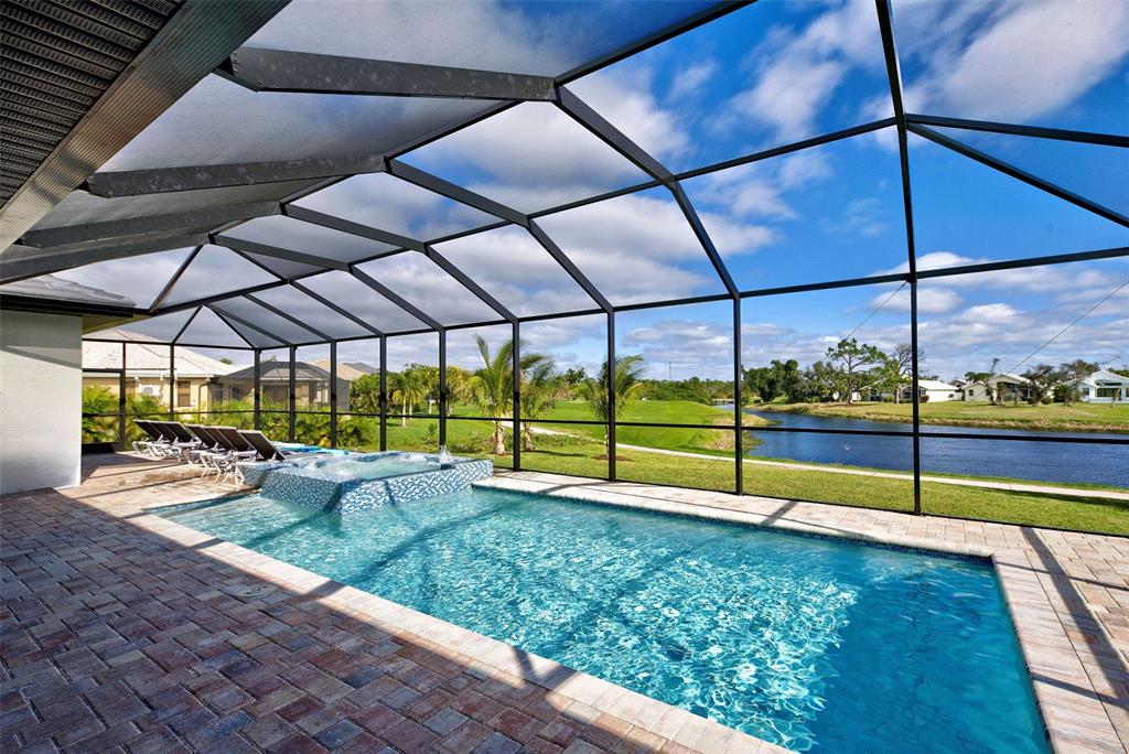 19 Windward Road Placida, FL 33946 - Photo 3 of 55 a view of a tennis ground with a small yard