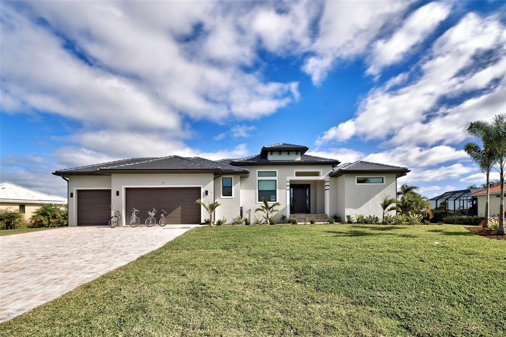 19 Windward Road Placida, FL 33946 - Photo 34 of 55 a view of house with yard