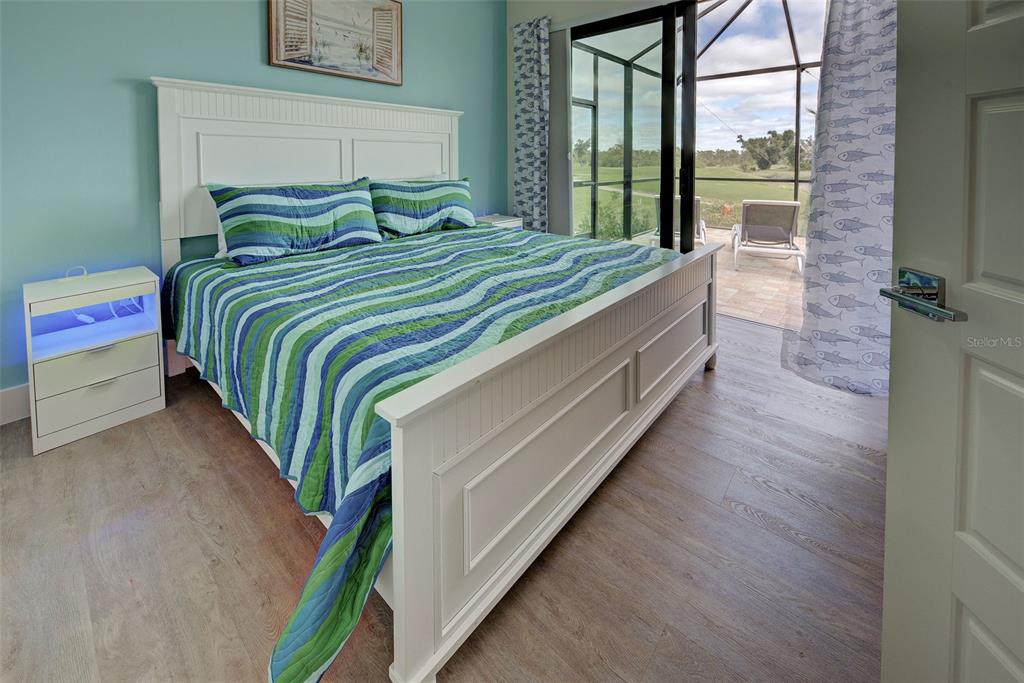 19 Windward Road Placida, FL 33946 - Photo 34 of 56 a bedroom with bed and window