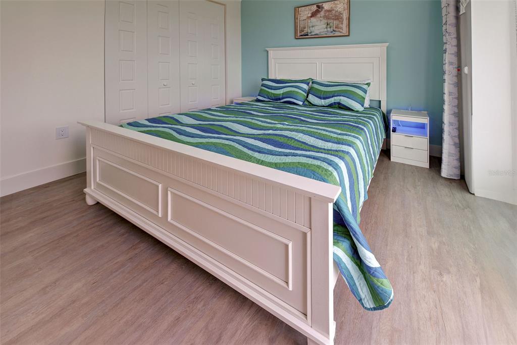 19 Windward Road Placida, FL 33946 - Photo 37 of 56 a bedroom with bed and a window