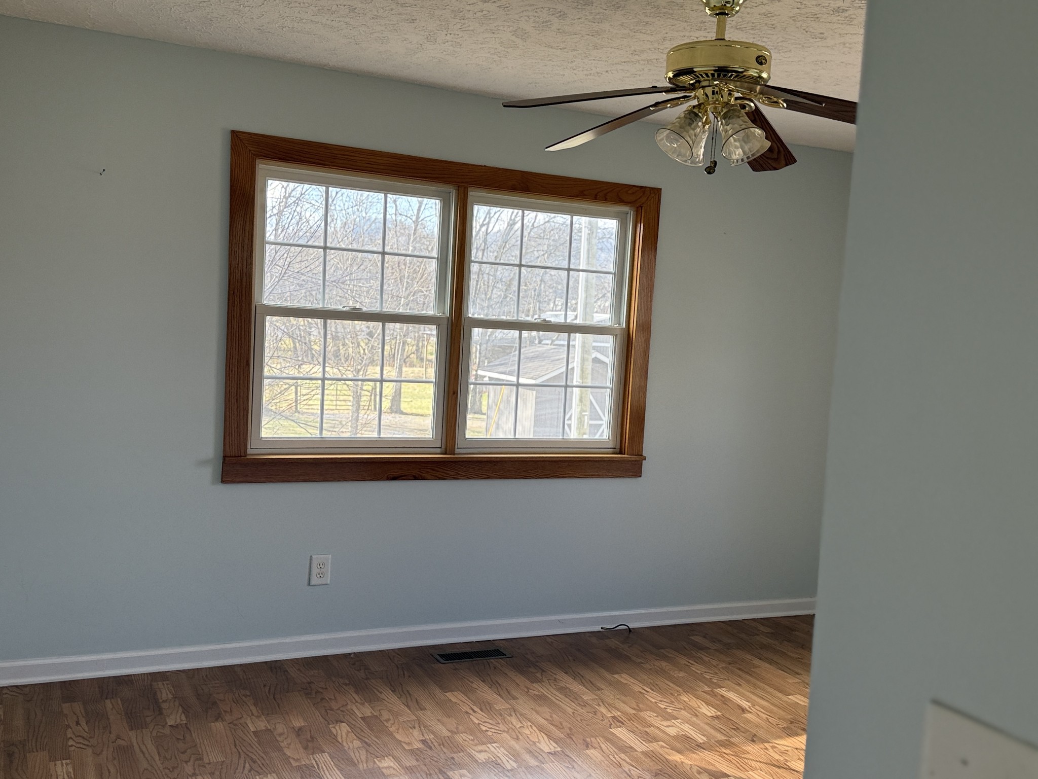 313 Murfreesboro Road Woodbury, TN 37190 - Photo 7 of 8 a view of empty room with windows