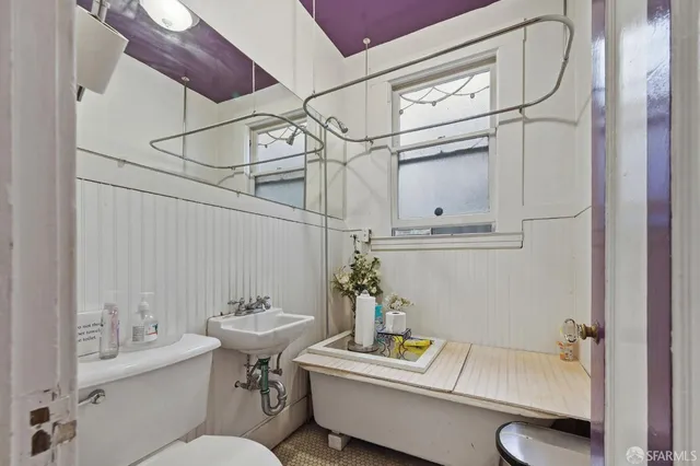 a room with gym equipment and a window