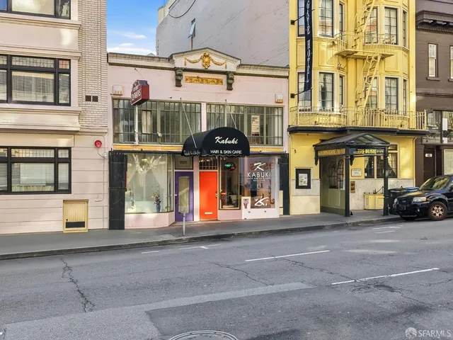 a view of a brick building with a large windows