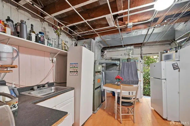 a view of entryway with wooden floor and stairs