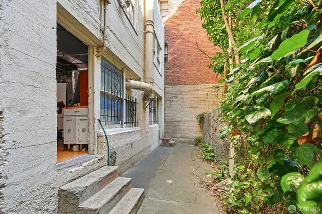a bathroom with a sink and cabinets