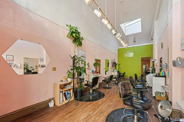 a table with wooden floor and a potted plant