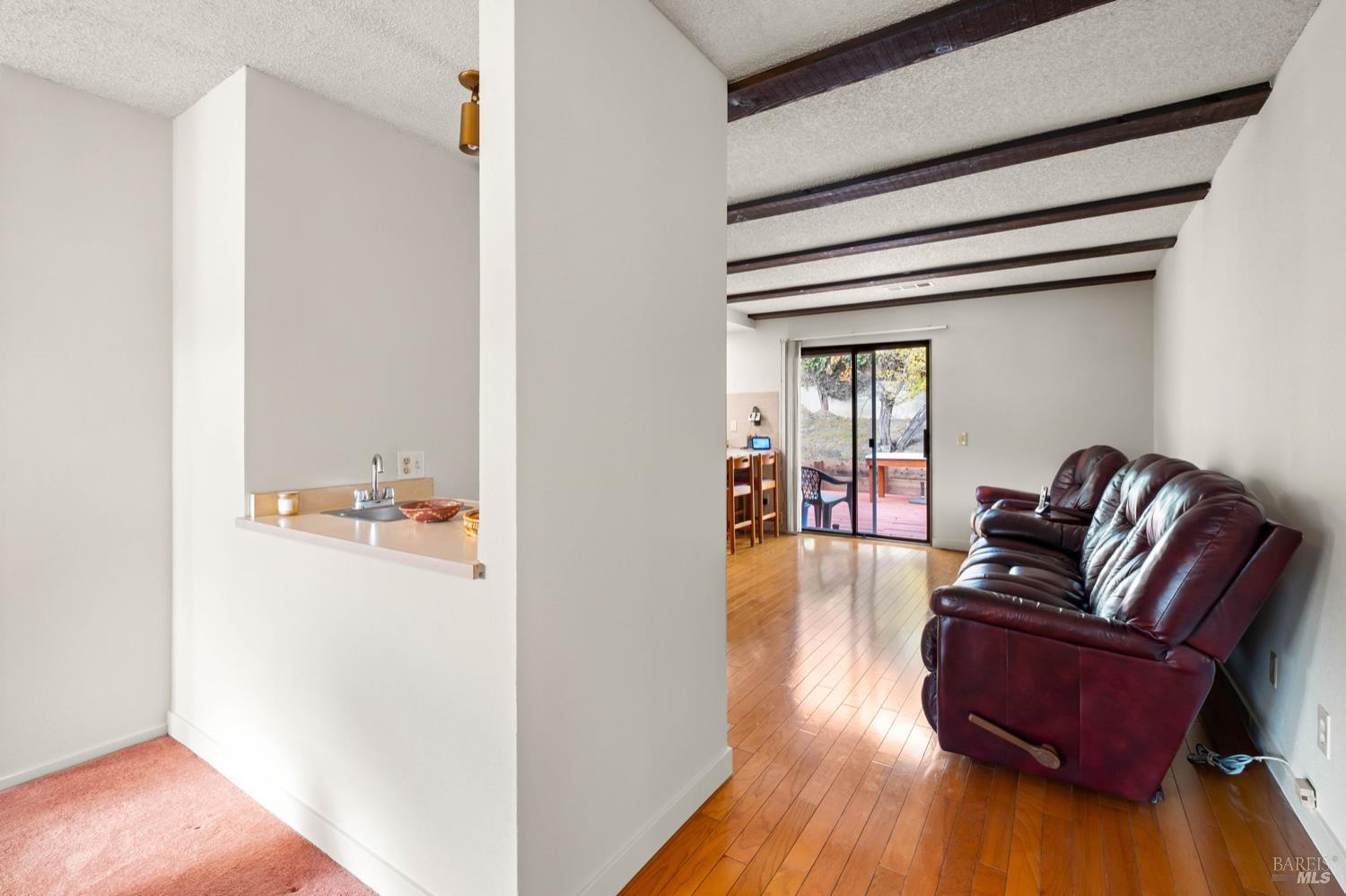 5044 Santa Rita Road El Sobrante, CA 94803 - Photo 14 of 27 a living room with furniture and wooden floor