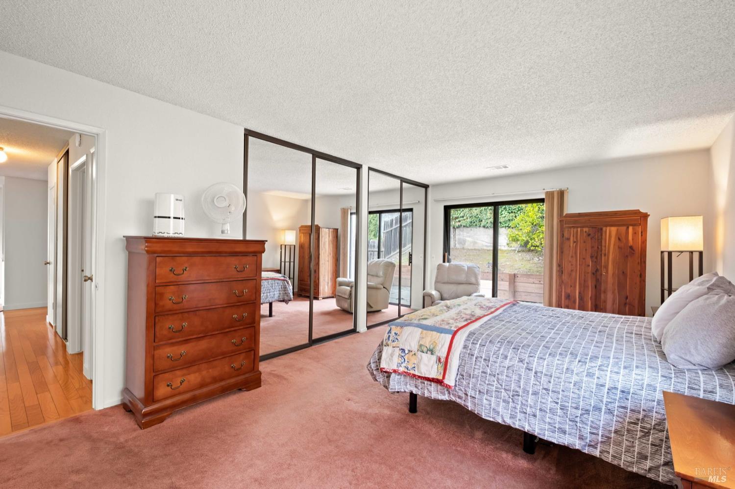 5044 Santa Rita Road El Sobrante, CA 94803 - Photo 20 of 27 a bedroom with a bed and a dresser