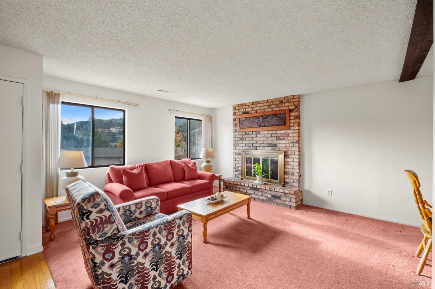 5044 Santa Rita Road El Sobrante, CA 94803 - Photo 3 of 27 a living room with furniture and a window