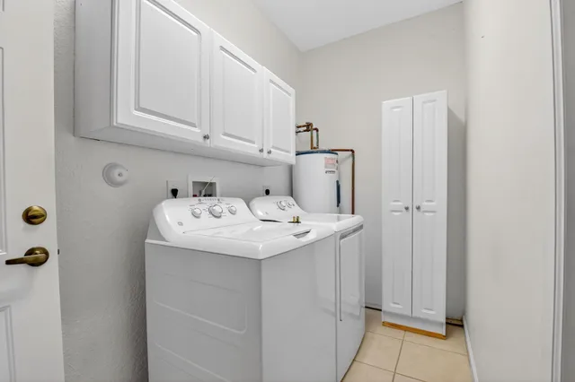 a view of a swimming pool with an outdoor seating