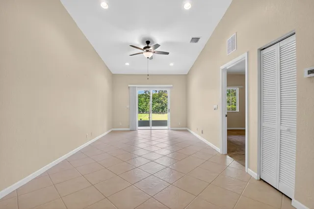 a view of a kitchen with a sink and dishwasher cabinets