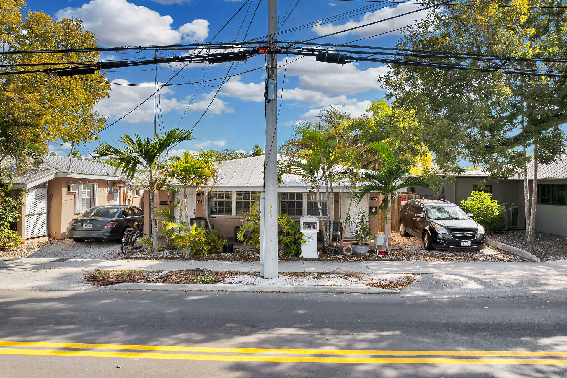1119 Simonton Street, Unit A2 & C1 Key West, FL 33040 - Photo 1 of 20 a view of a street with cars on road