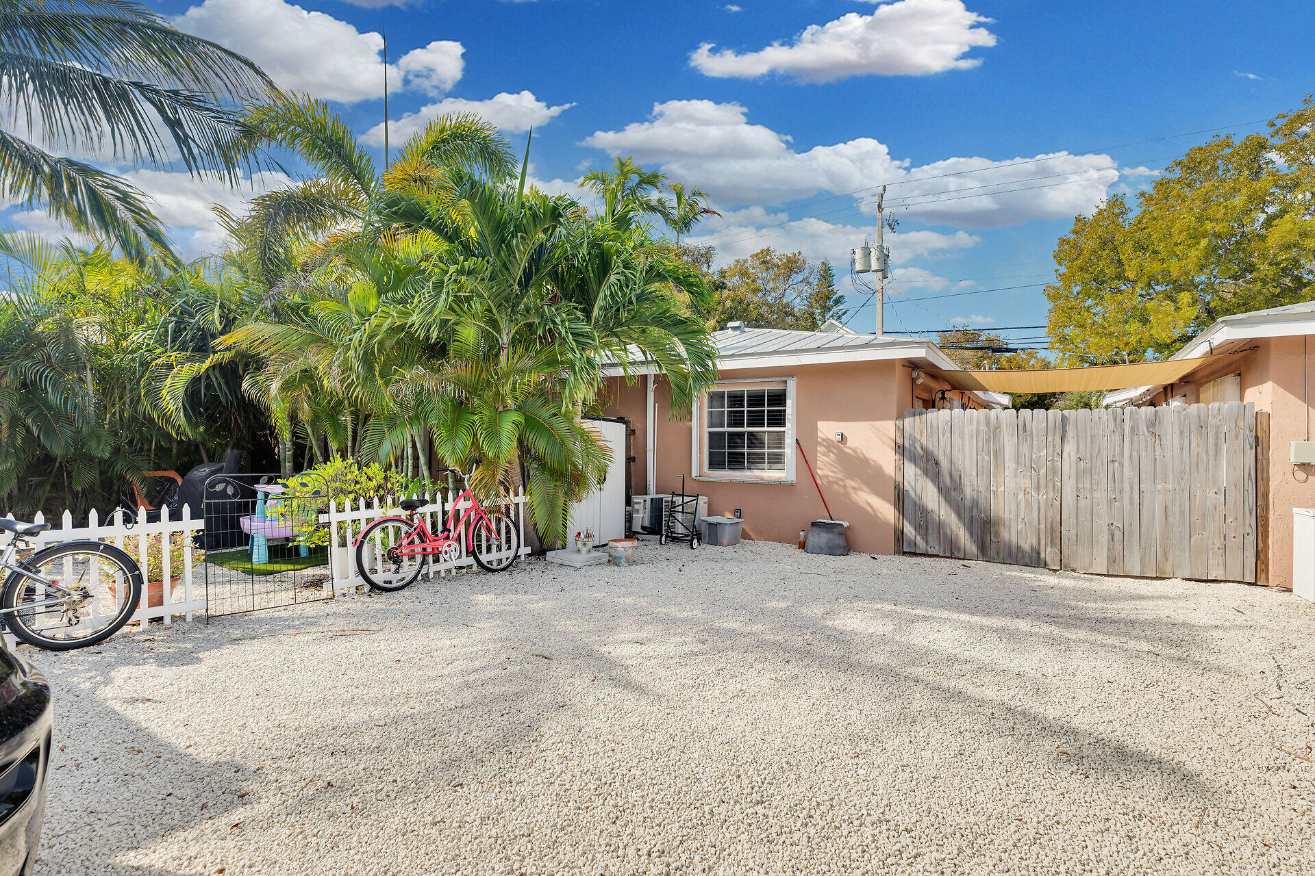 1119 Simonton Street, Unit A2 & C1 Key West, FL 33040 - Photo 17 of 20 a view of a car park in front of a house