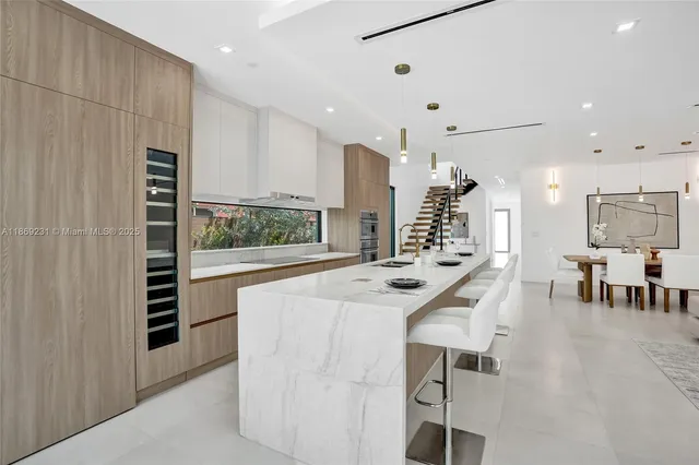 a bathroom with a sink and mirror