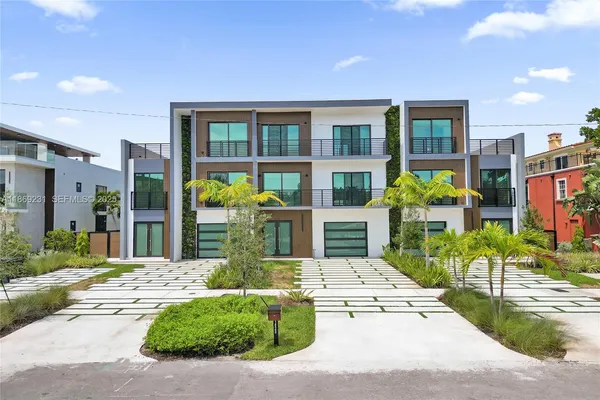 a view of a city with tall buildings in the background