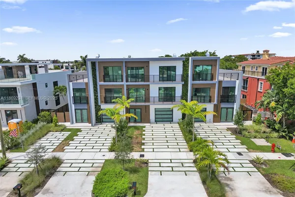a building with trees in front of it