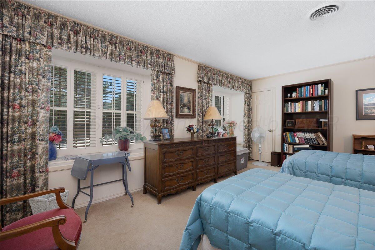 1615 South Bryan Street, Unit 1 Amarillo, TX 79102 - Photo 22 of 30 a bed room with furniture and a window