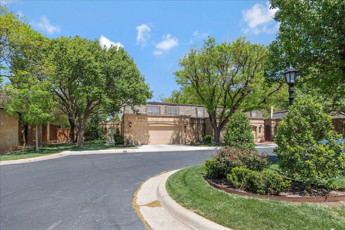 1615 South Bryan Street, Unit 1 Amarillo, TX 79102 - Photo 30 of 30 a front view of a house with a yard