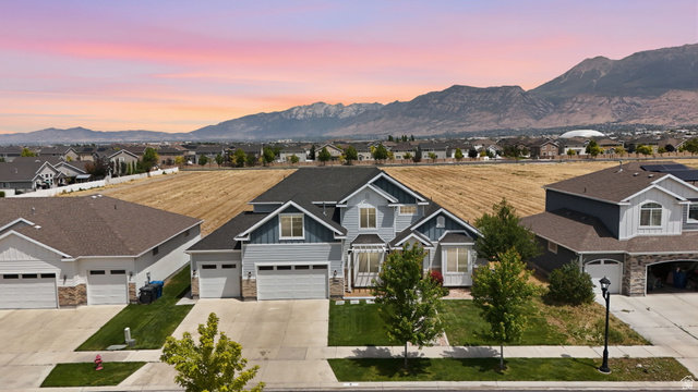 111 East Silver Oak Road Vineyard, UT 84059 - Photo 34 of 50 Multi-level residence featuring a light blue and dark blue facade with stone accents
