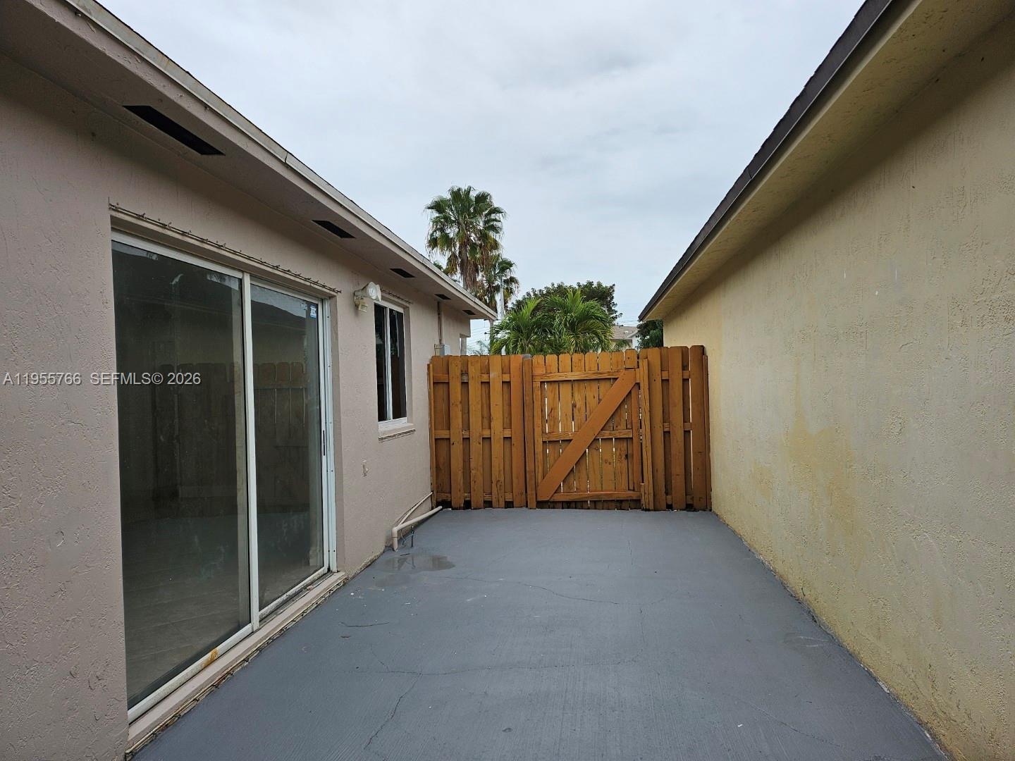 16150 Southwest 138th Court Miami, FL 33177 - Photo 8 of 10 a view of an entrance gate