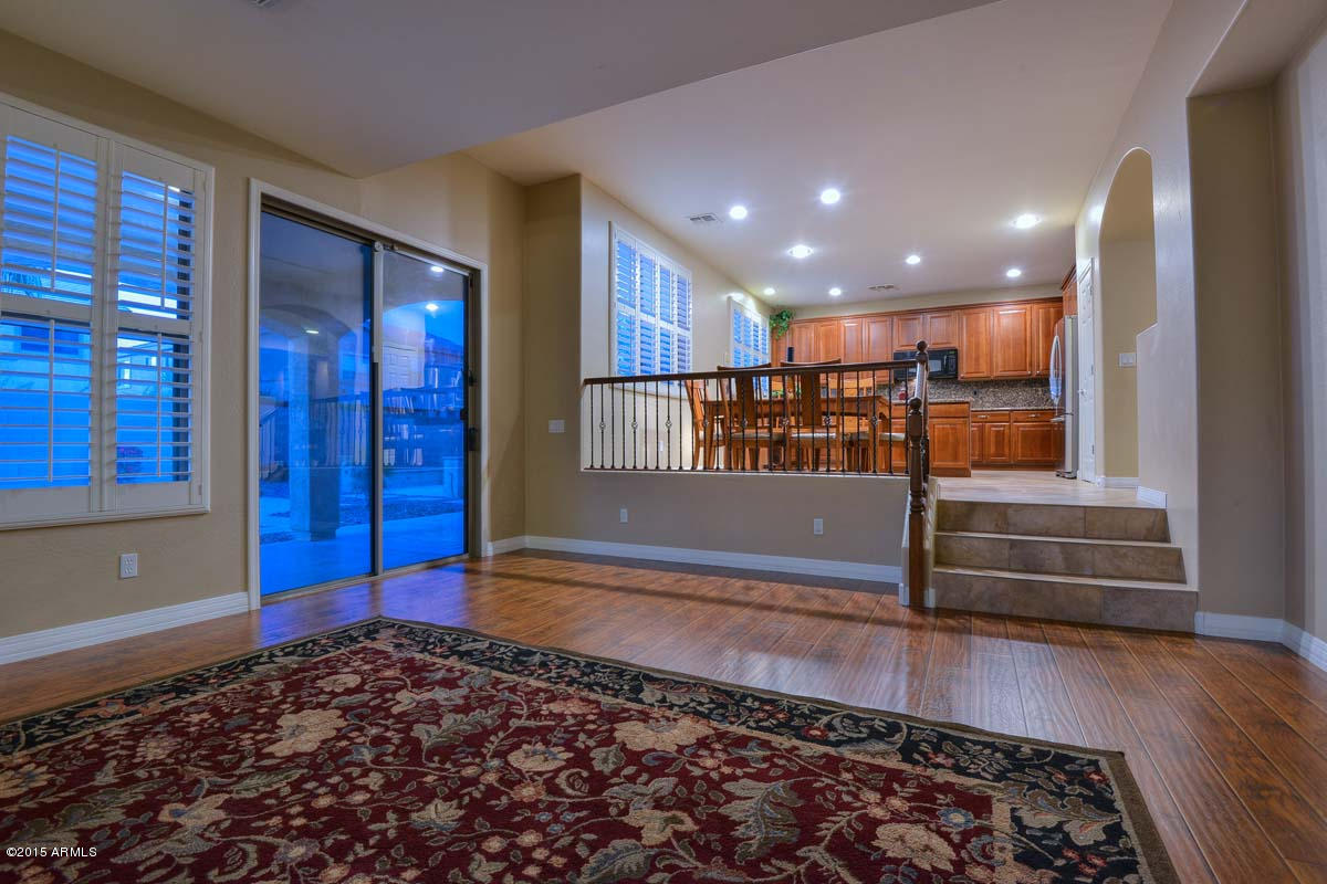 5020 West Yearling Road Phoenix, AZ 85083 - Photo 53 of 62 Night-Family Room-Kitchen