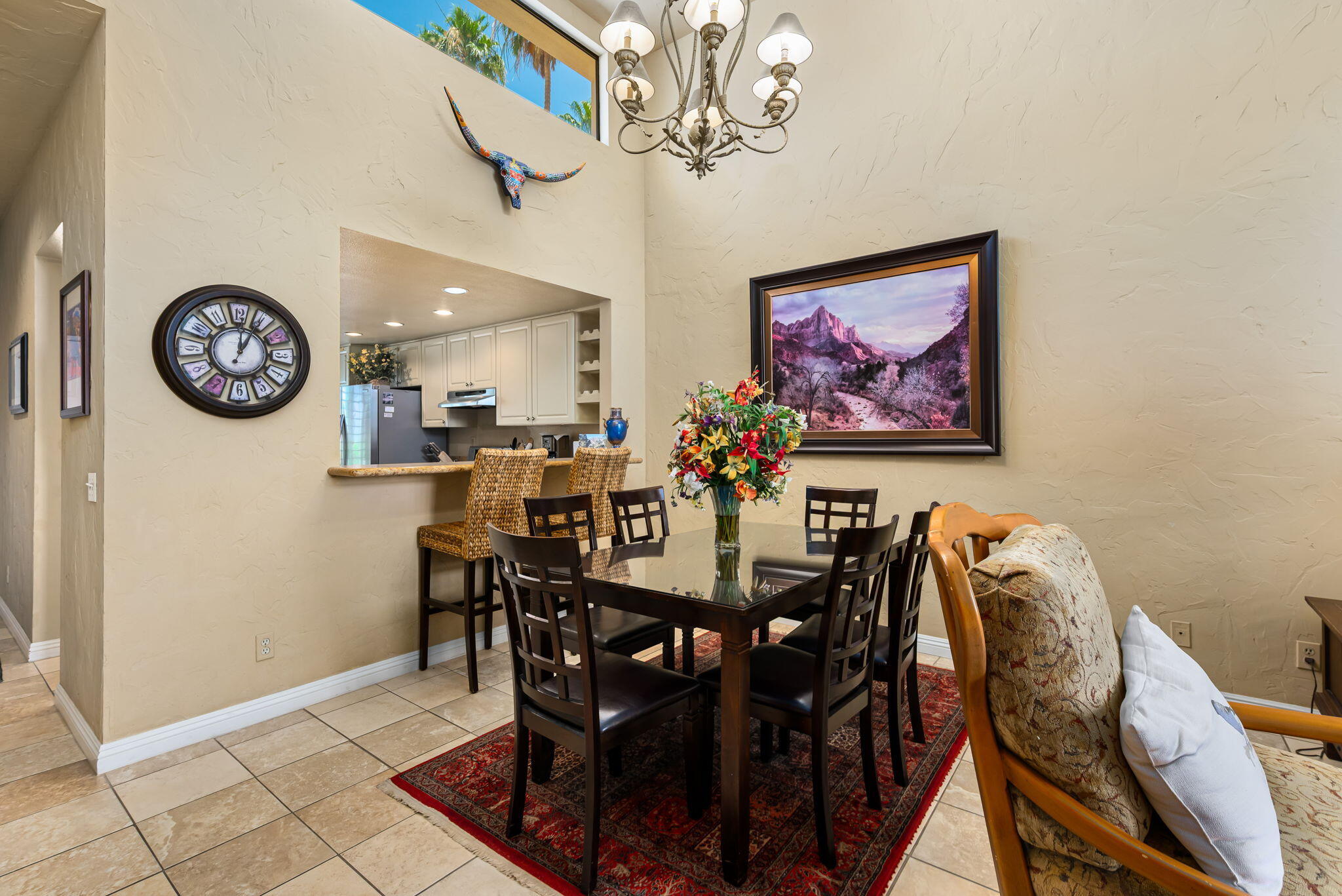80601 Oak-Tree La Quinta, CA 92253 - Photo 15 of 64 a view of a dining room with furniture and chandelier