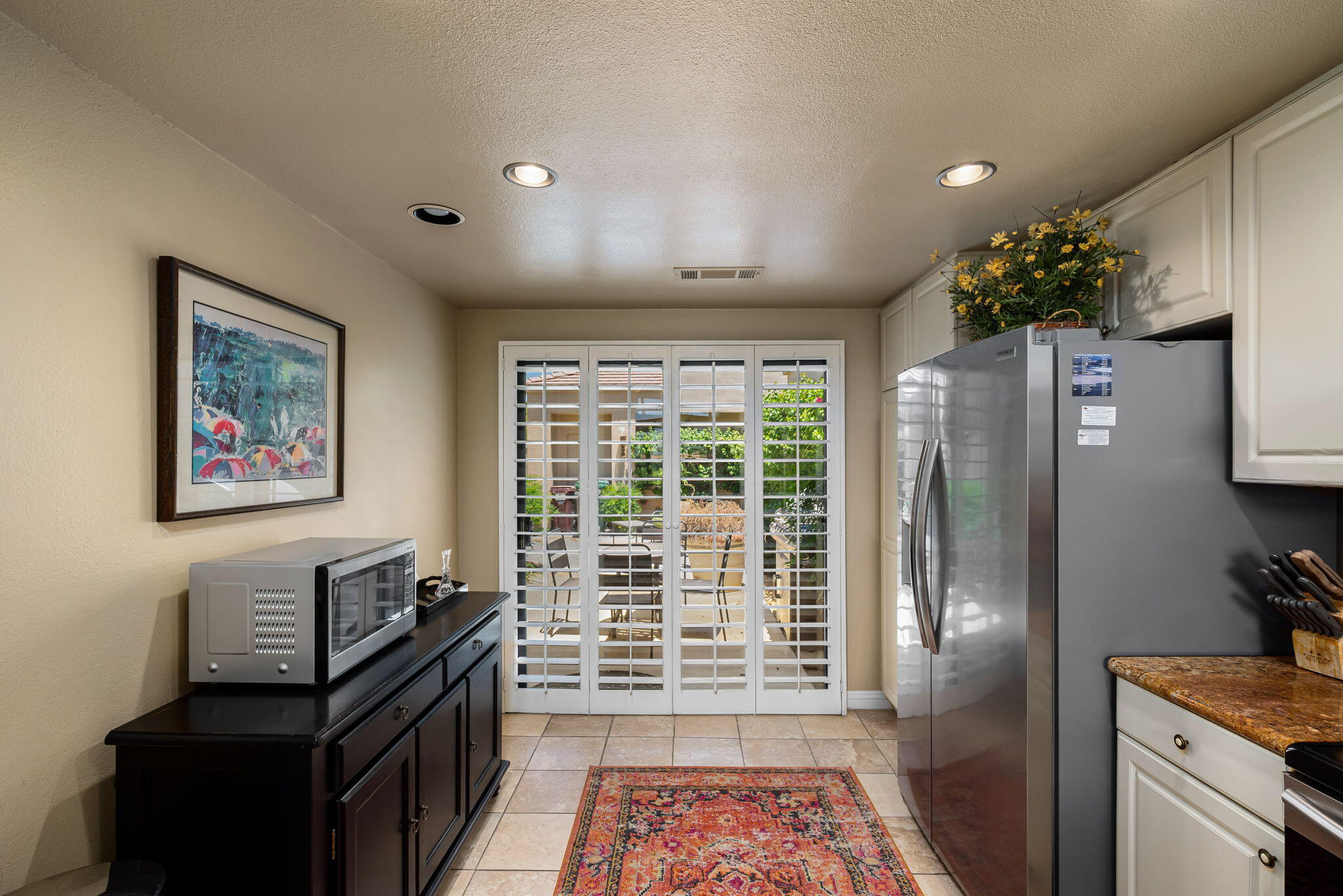 80601 Oak-Tree La Quinta, CA 92253 - Photo 21 of 64 a view of a workspace with furniture and a window