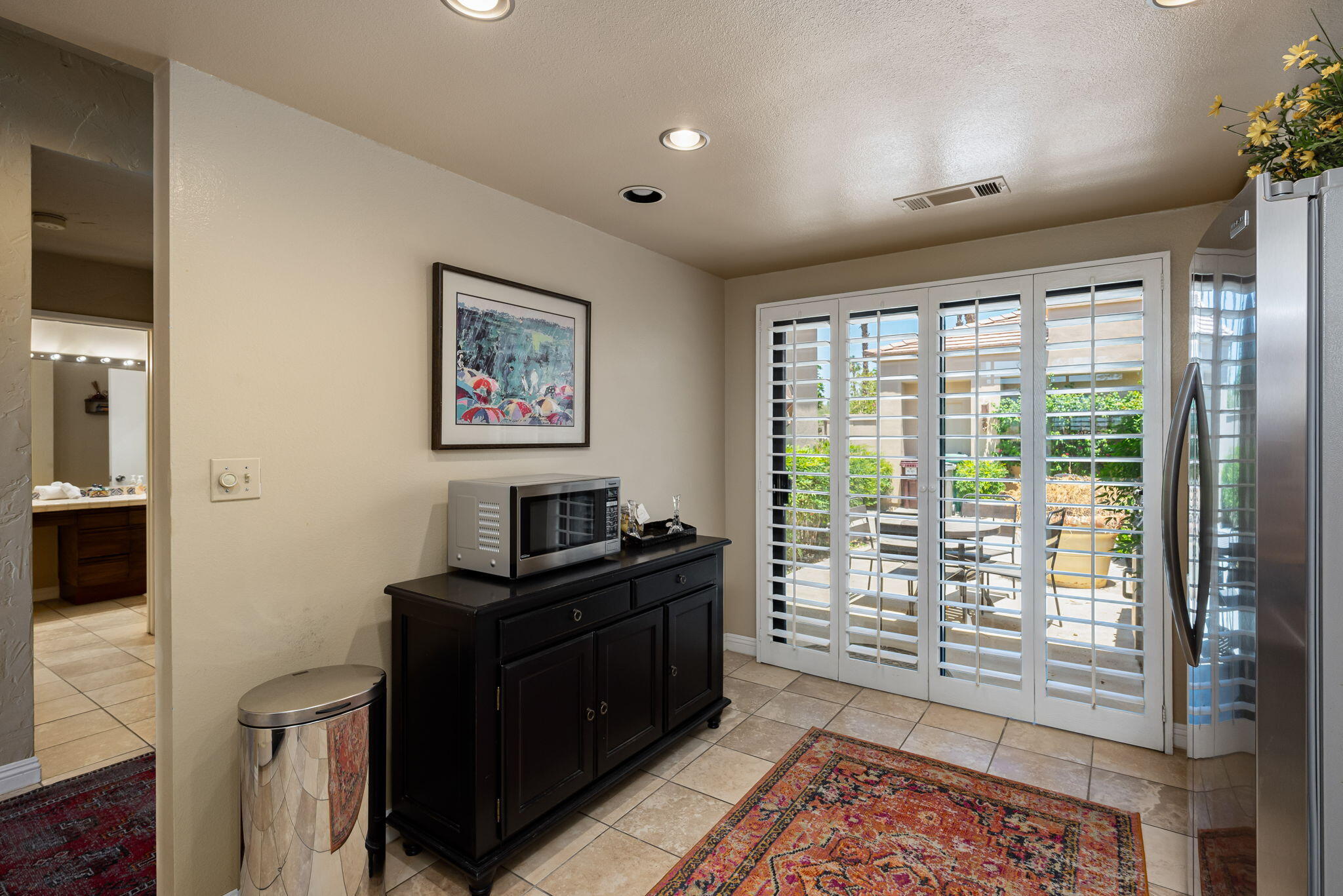 80601 Oak-Tree La Quinta, CA 92253 - Photo 22 of 64 a view of a workspace with furniture and a window