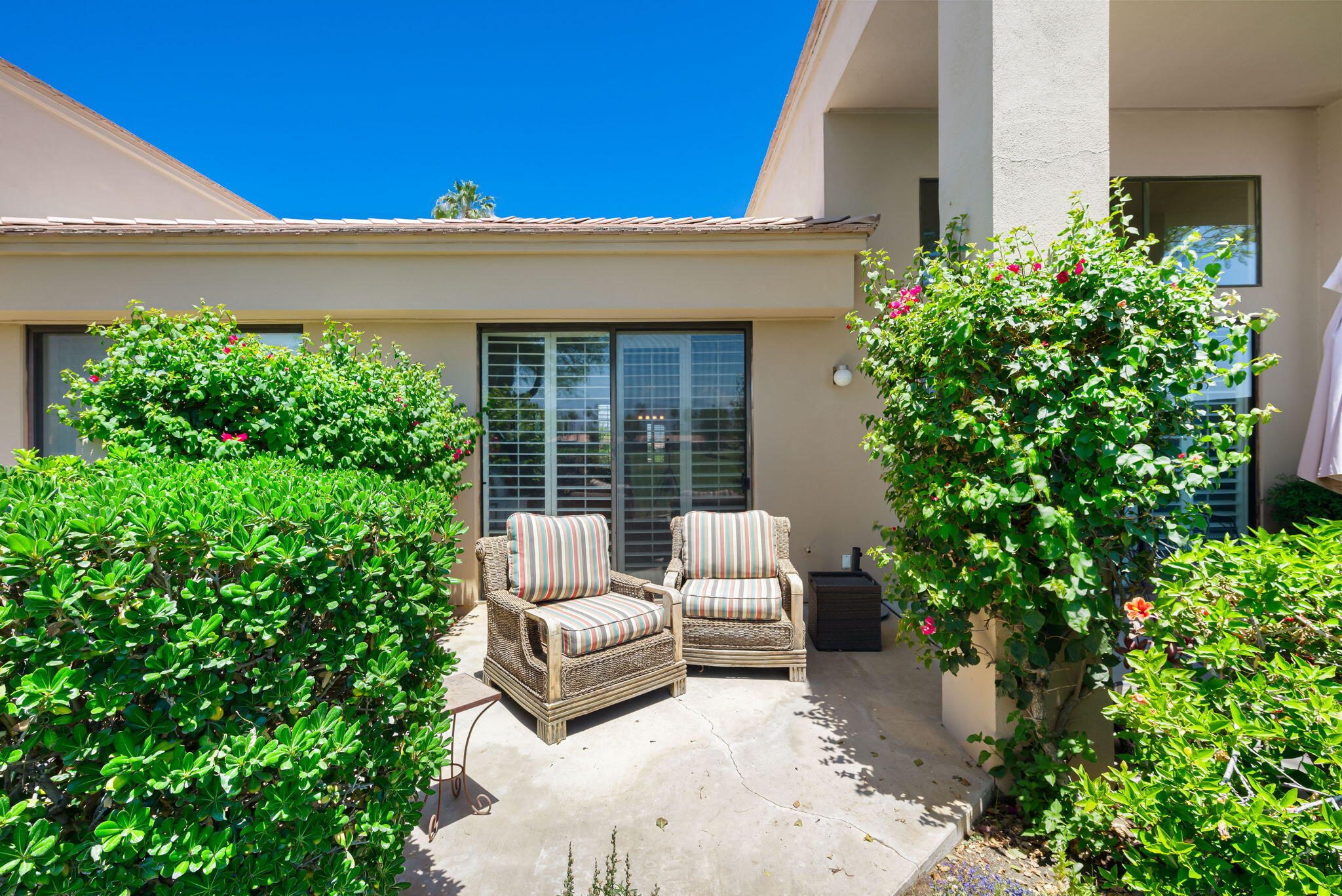 80601 Oak-Tree La Quinta, CA 92253 - Photo 24 of 64 a view of a patio with couches and potted plants