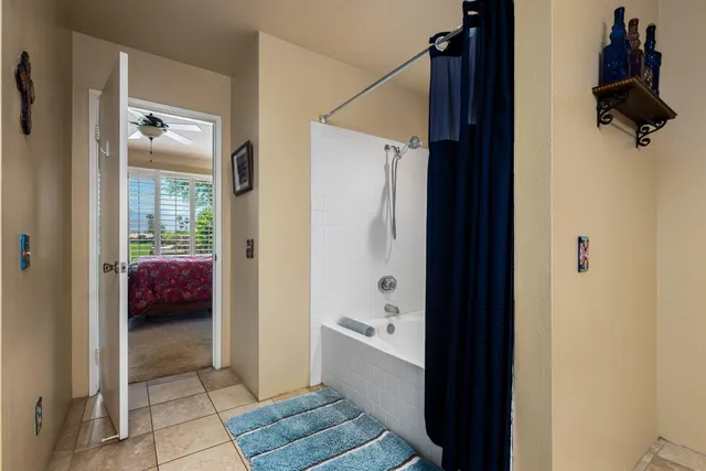 a view of a chairs and table in the patio