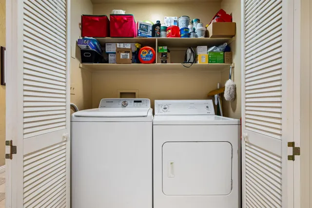 a view of a house with backyard sitting area and garden