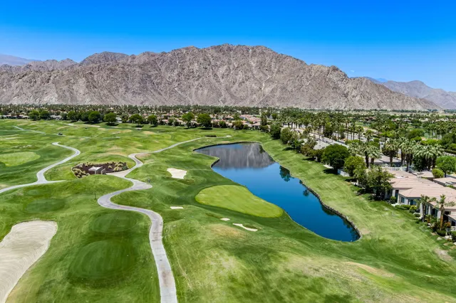 a view of a house with swimming pool