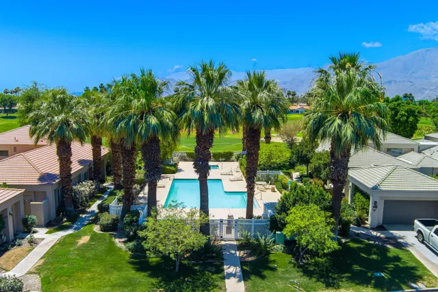 a view of a lake from a balcony