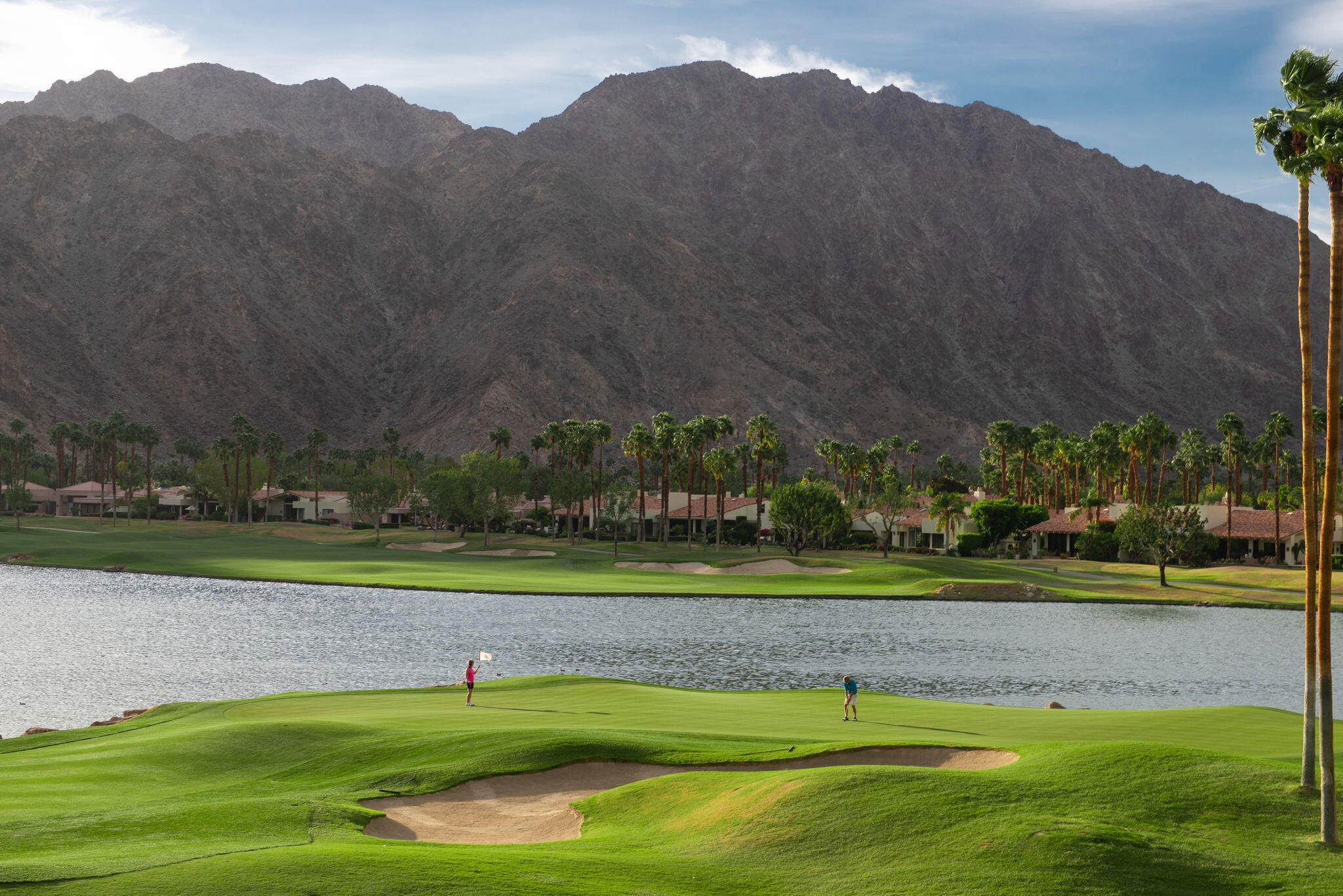 80601 Oak-Tree La Quinta, CA 92253 - Photo 52 of 64 a view of a golf course with a lake