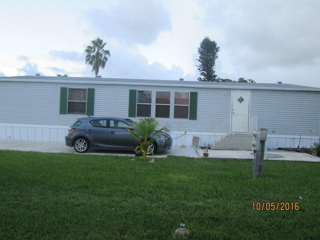 1680 Southwest 66th Avenue Boca Raton, FL 33428 - Photo 1 of 9 Front
