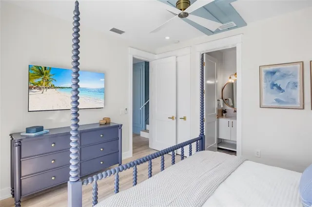 an aerial view of a house with a lake view